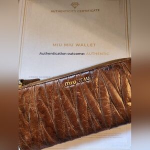 Preowned Miu Miu brown wallet‎ with COA